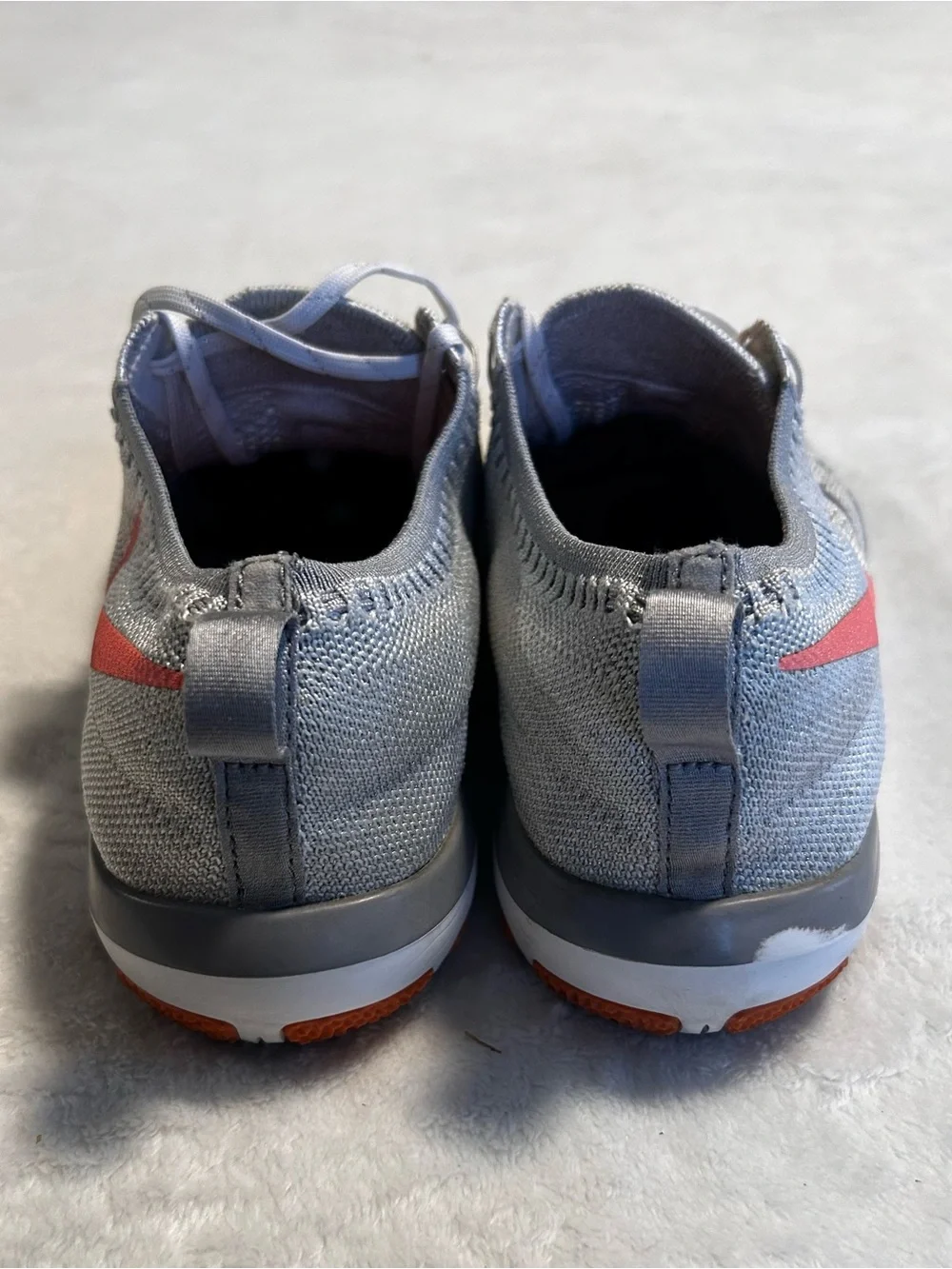 Nike Men's Gray Knit Running Shoes with Coral Accents